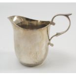 A silver jug, with scroll handle, London 1900,
