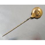 A 19th century gilt metal stick pin, with circular roundel decorated with buckle,FITTED WITH A