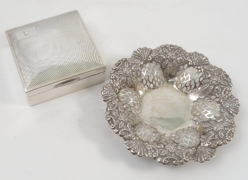 A circular silver dish, with embossed and pierced shaped edge, Chester 1898, weight 1oz,