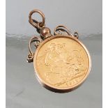 A 1912 sovereign, in a scroll top pendant mount, stamped '9ct', weight 9.
