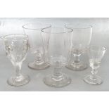 A group of Antique drinking glasses, to include small rummers, some with faceted decoration