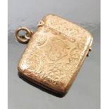 A 9ct gold vesta case, by H Matthews, Birmingham 1903, of usual engraved form, monogrammed,