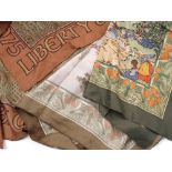 A quantity of Liberty silk scarves, to include The Laws of the Game of Cricket, Cunard Line,