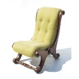 A late 19th century mahogany framed nursing chair,