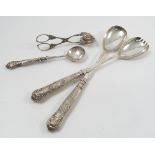 A pair of silver handled Queens pattern salad servers, together with matching fish servers,