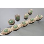 A suite of Chinese jade jewellery, comprising a bracelet, ring, earrings and brooch,