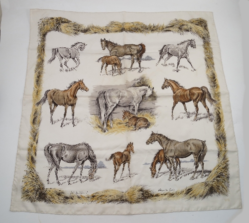 A Hermes Paris silk scarf, decorated with mares and foals to a cream ground, with straw border,