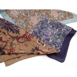 A quantity of Liberty silk scarves, in stylized floral patterns,