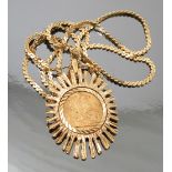 A 1912 sovereign, in a 9ct gold star burst style pendant mount, on a fancy link 9ct gold chain,