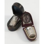 A hallmarked silver thimble, with engraved decoration, in leather covered case,