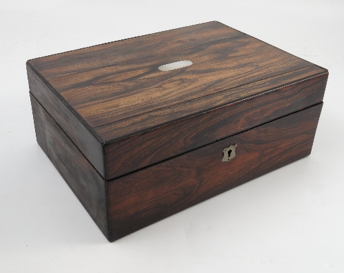 A 19th century coromandal wood box, with mother of pearl plaque to the lid and lied interior,