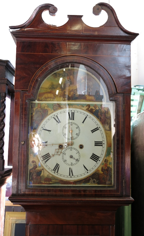 A mahogany long case clock, the painted arched dial decorated with figures,