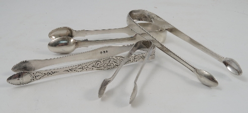A pair of Georgian silver sugar tongs, with bright cut decoration, London 1818,