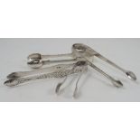 A pair of Georgian silver sugar tongs, with bright cut decoration, London 1818,