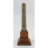 A Mauklin ware thermometer,