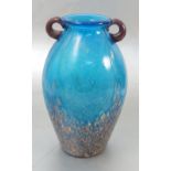 A 20th century glass vase, decorated in blue, with gold and yellow flecks,