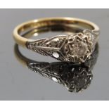 A diamond single stone ring, the illusion set brilliant cut of approximately 0.