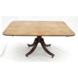 A 19th century mahogany rectangular shaped breakfast table,