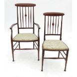 An Edwardian mahogany Art Nouveau armchair, and single chair,