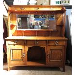An Arts and Crafts oak sideboard, in the style of Shapland and Petter,