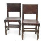 A set of six leather upholstered Cromwellian style dining chairs