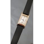 A 9ct gold cased Walker wrist watch, the rectangular silvered dial with subsidiary dial,