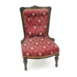 An ebonised and burr wood nursing chair,