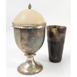 A silver cup and cover, originally fitted with an emu egg, now broken, of goblet form,