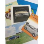 A selection of car sales brochures,