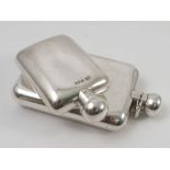 A silver hip flask, with twist hinged cover, of rectangular form, London 2003, weight 5oz,