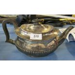 A Victorian silver oval teapot, the lower body with fluted decoration,