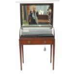 A 19th century mahogany display cabinet, with roll front fitted with a drawer,