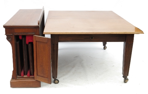 An extending mahogany dining table, of rectangular form,