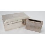 A silver cigarette box, with engine turned decoration to the lid and vacant rectangular cartouche,