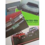 A selection of car sales brochures,