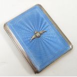 A silver and enamel cigarette case, of rectangular form with blue enamel and RAF badge to centre,