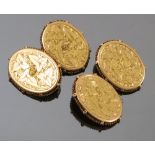 A pair of Victorian 15 carat gold cufflinks, Birmingham 1880, the oval panels engraved with leaves,