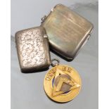 A Masonic pendant, of a set square and compass, with a monogram hanging within, stamped 'T.W.