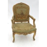 A Continental giltwood armchair,