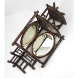 An Edwardian set of bamboo effect corner shelves, decorated in the Aesthetic style,