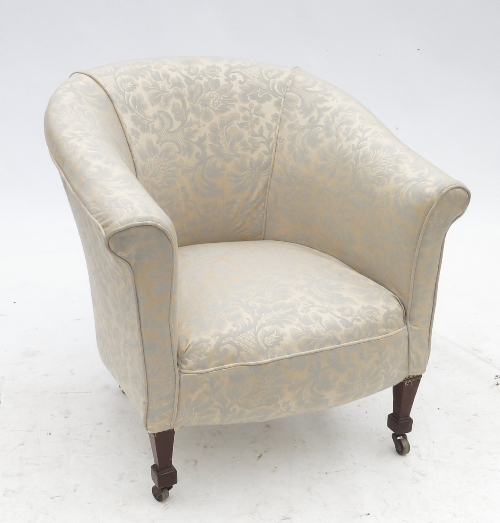 An Edwardian tub chair,