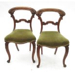 A set of four 19th century mahogany spoon back dining chairs,