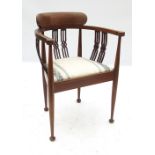 An Edwardian mahogany tub chair,