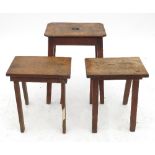 A late 19th century oak rectangular topped stool, with carry handle aperture,