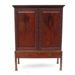 A mahogany cupboard on stand,