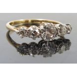 A five stone diamond ring, the graduated old cut brilliants totalling approximately 1.