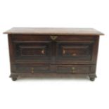 An Antique oak mule chest,