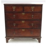 An 18th century oak chest, fitted two short drawers over three graduated long drawers, width 36.