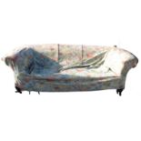 A two seat Chesterfield sofa, raised on short turned legs,