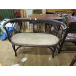 An Edwardian two seater sofa, with bone line inlay,